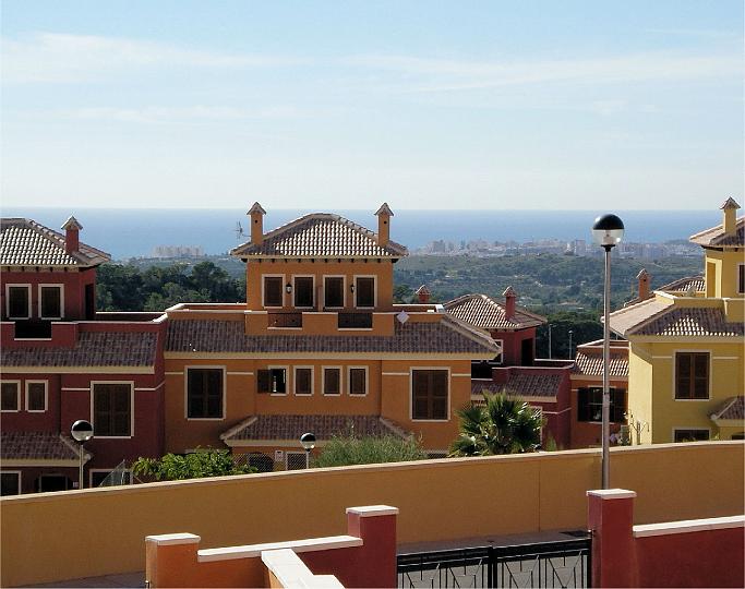 Imgp3165-1.jpg - The front of the property from a little higher above the pool. In the background you can see the seaside town of Villajoyosa.